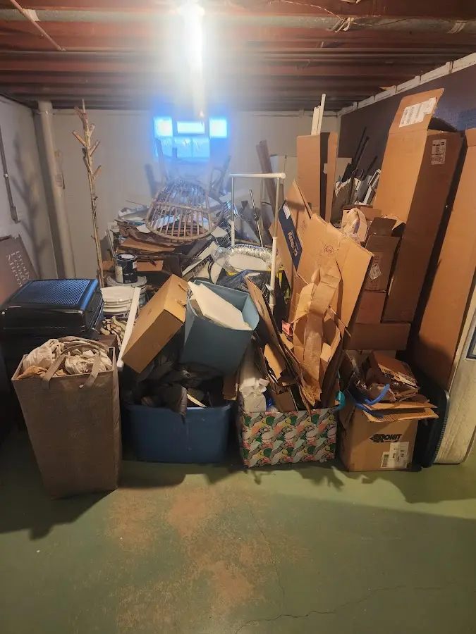 Roll-off dumpster container at job site for Cleanout Dumpster Rental in Crookston